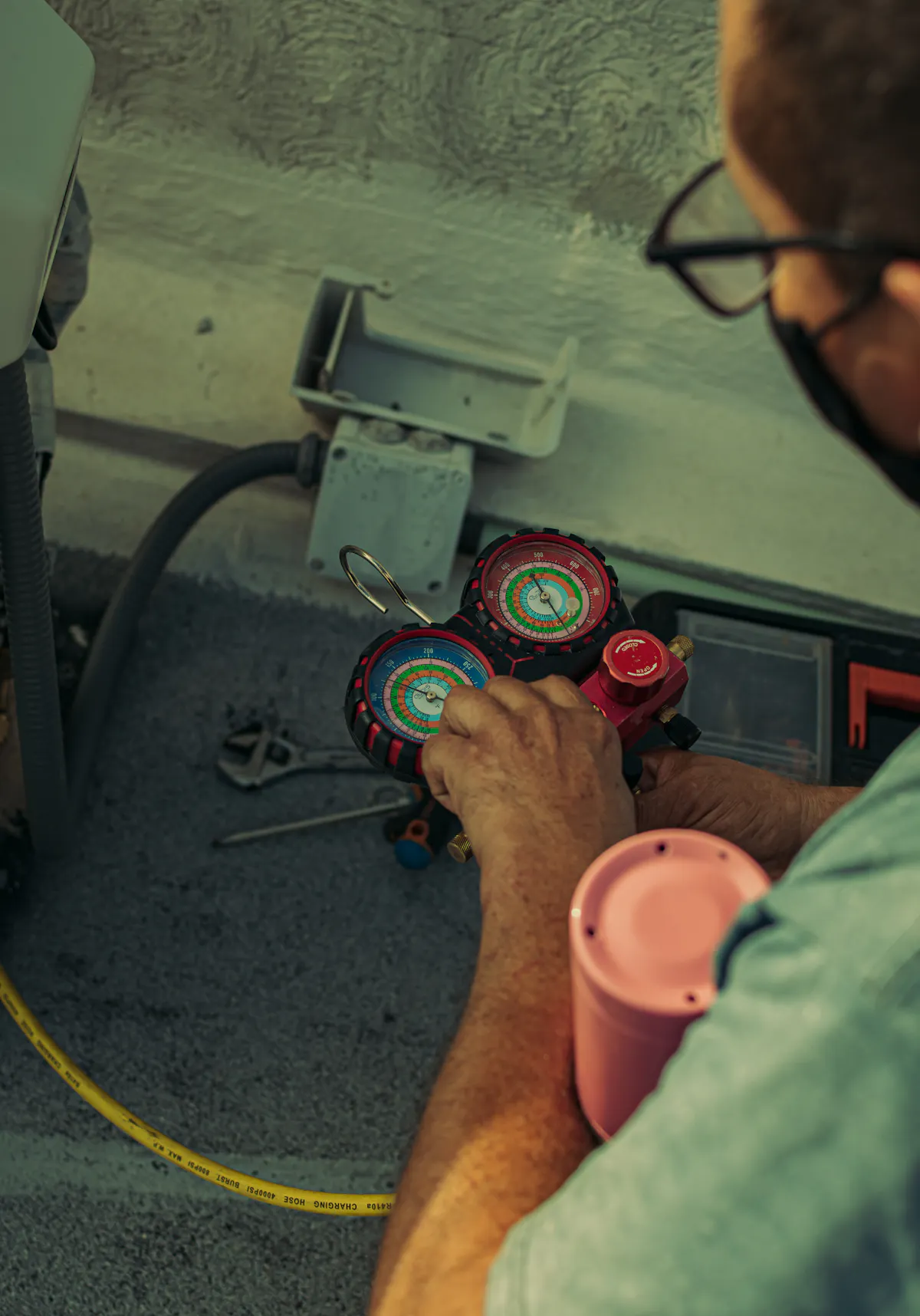 Certified Can Heating Cooling technician working on an HVAC system